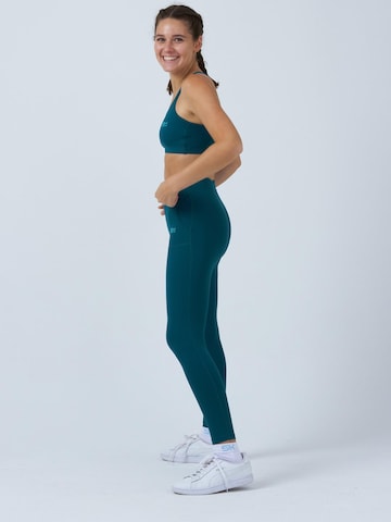 SPORTKIND - Skinny Leggings 'Leggings' en verde