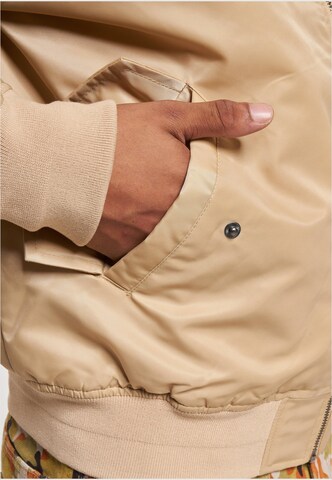 Veste mi-saison Karl Kani en beige