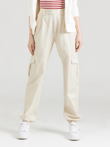 Tapered Pantaloni cargo di Tommy Jeans in beige: frontale