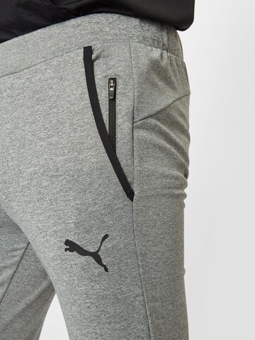 PUMATapered Sportske hlače - siva boja