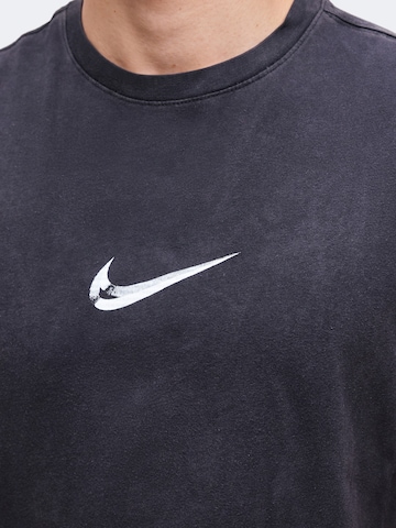 Nike SportswearTehnička sportska majica - crna boja
