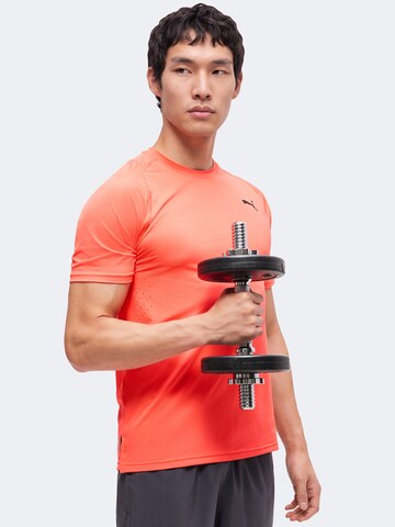 PUMA Performance shirt 'Pwrmode' in Orange