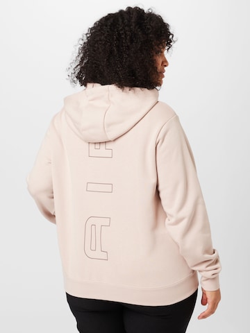 Nike Sportswear Urheilullinen collegetakki värissä harmaa