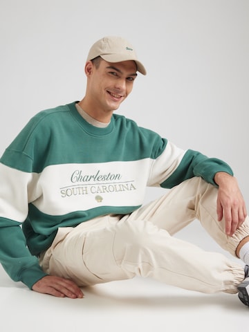 HOLLISTER Sweatshirt 'DESTINATION' in Green: front