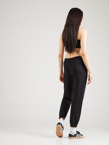 juoda Reebok Siaurėjantis Sportinės kelnės 'Chenille'