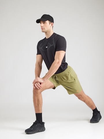 Reebok Szabványos Sportnadrágok 'WOR' - zöld