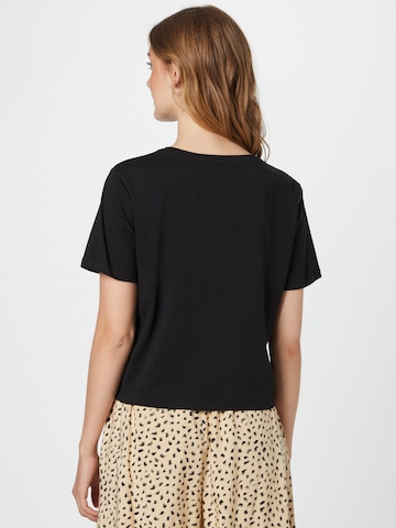 ONLY - Camiseta 'TASTY' en negro