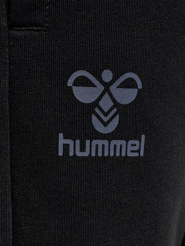 Effilé Pantalon de sport 'Offgrid' Hummel en noir