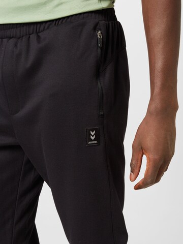 Hummel Slim fit Sports trousers in Black