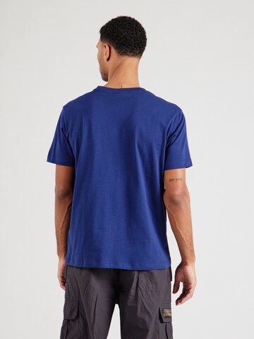 Maglietta di Champion Authentic Athletic Apparel in blu