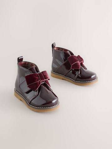 Next - Botas en rojo