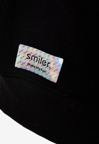 Sweat-shirt 'Happy' smiler. en noir