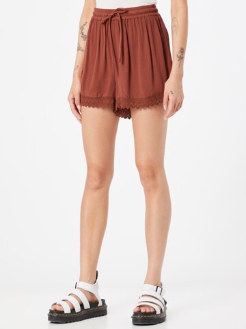 ABOUT YOU Loose fit Pants 'Dorina' in Brown: front