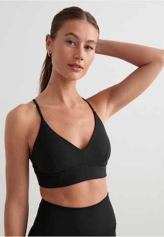 Bustino Reggiseno sportivo di Aim'n in nero: frontale