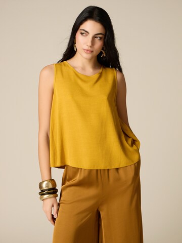 Haut oltre en jaune