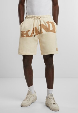 Karl Kani Regular Pants in Beige: front