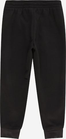 Effilé Pantalon de sport Jordan en noir