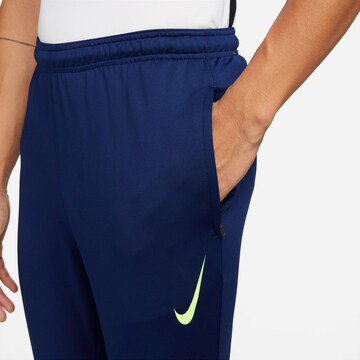 NIKE Slimfit Sporthose in Blau