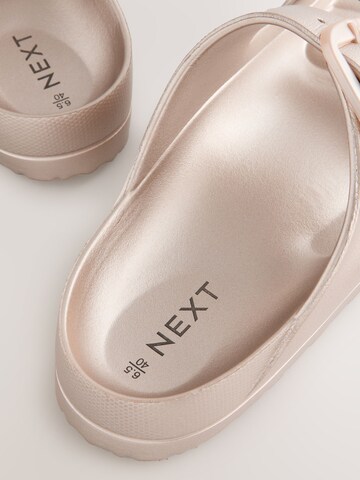 Zoccoletto di Next in oro