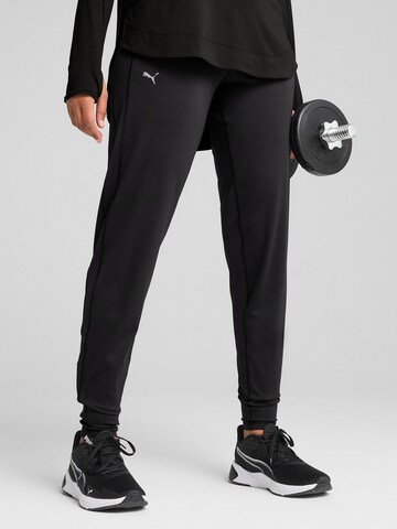 Skinny Pantaloni sport de la PUMA pe negru: față