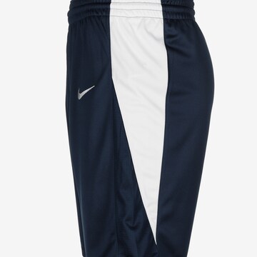 NIKE Loose fit Workout Pants in Blue