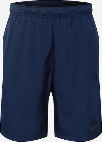 NIKE Regular Sports trousers in Blue: front