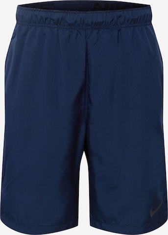 NIKE Workout Pants in Blue: front