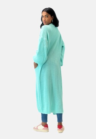 Manteau en tricot Elara en vert