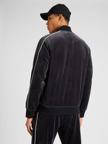 Nike Sportswear - Sudadera con cremallera en negro