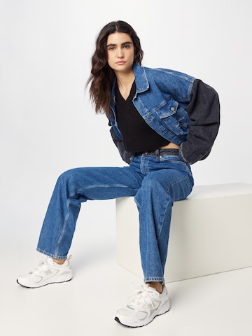 Calvin Klein Jeans كنزة صوفية بلون أسود
