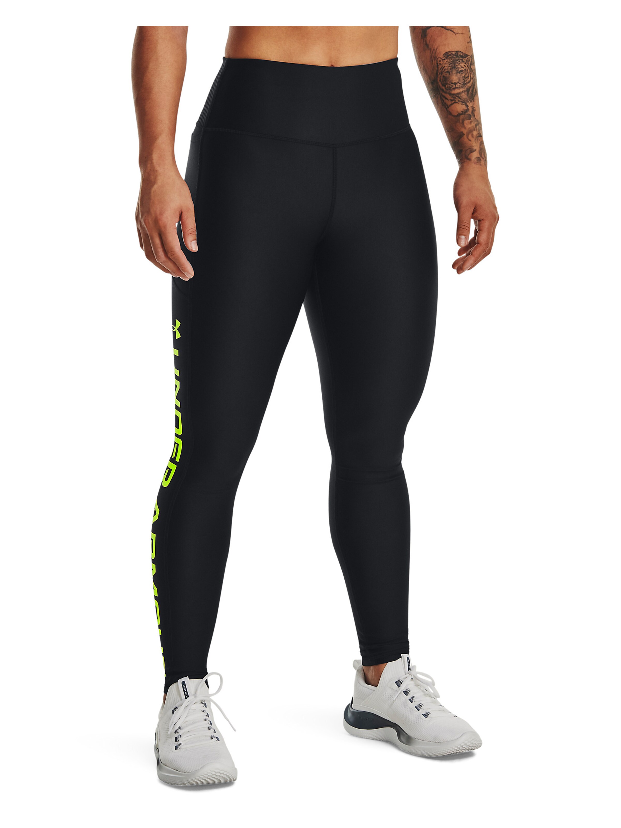 UNDER ARMOUR Skinny Workout Pants in Black: front