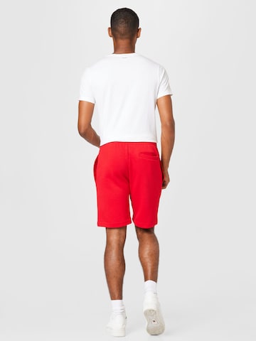 LACOSTE Regular Trousers in Red