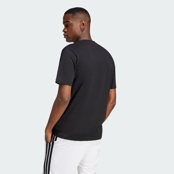 ADIDAS SPORTSWEAR - Camiseta funcional en negro