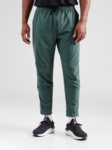 NIKE Конический (Tapered) Спортивные штаны 'UNLIMITED' в Зеленый: спереди