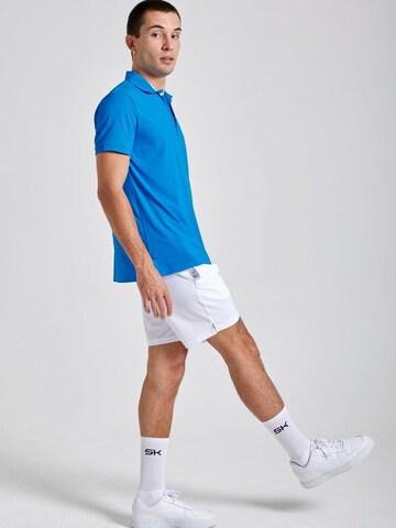 T-Shirt fonctionnel 'Polo' SPORTKIND en bleu