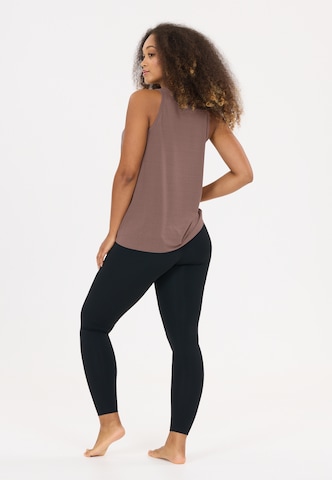 Athlecia Sports top 'Mota V2' in Brown