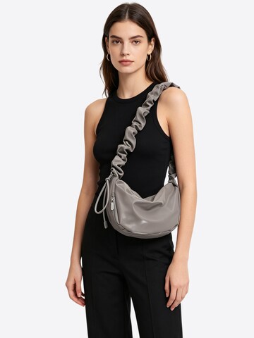 Magicshe Schultertasche‌ in Grau