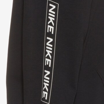 NIKE - Camiseta deportiva en negro