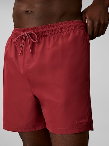 Calvin Klein Board Shorts in Red