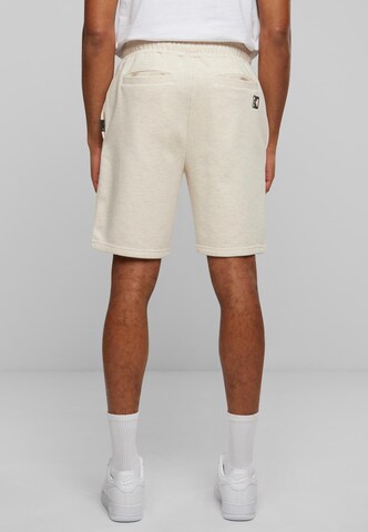 Karl Kani Regular Shorts in Beige