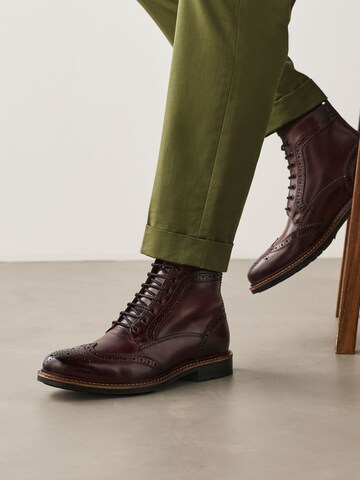 Boots stringati di Next in rosso