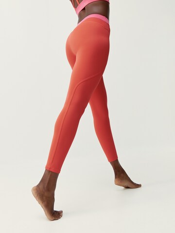 Skinny Pantalon de sport 'Navani' Born Living Yoga en orange