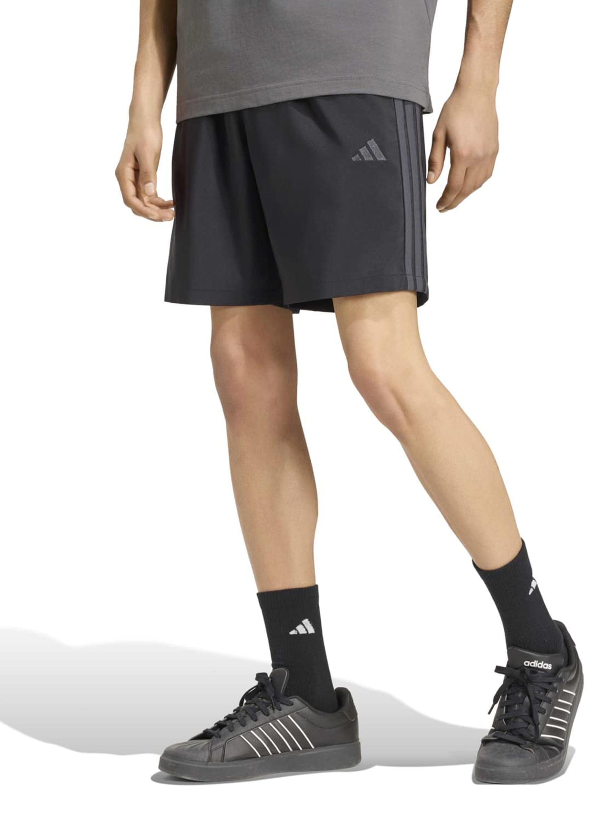 ADIDAS SPORTSWEAR Lużny krój Spodnie sportowe 'Essentials Chelsea Lite' w kolorze czarny: przód