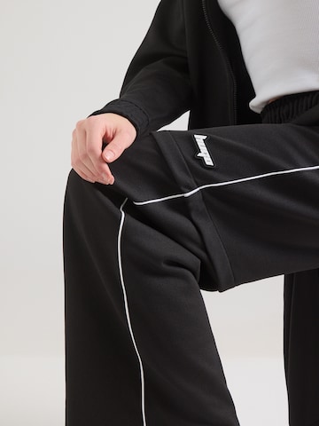 HUGO Lużny krój Spodnie 'Nateam_B' w kolorze czarny