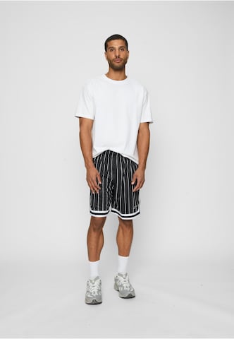 Regular Pantalon Karl Kani en noir