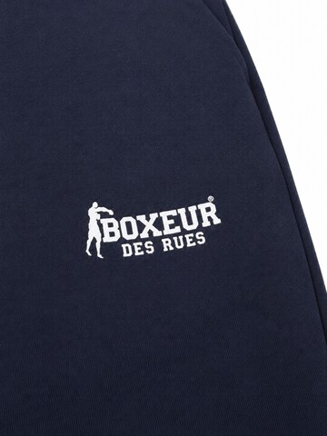 Boxeur des Rues Regular Sports trousers 'Herren Jogginghose Boxeur des Rues mit Kordelzug mit Metallspitzen, Marineblau, Weißes Logo, Baumwolle' in Blue