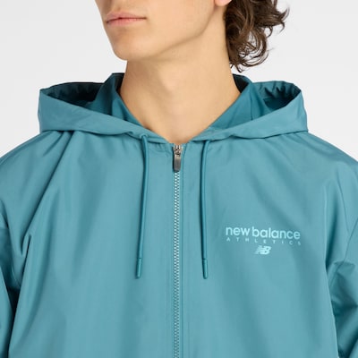 new balance Veste mi-saison 'Trackside Woven Jacket' en bleu / bleu cyan, Vue avec produit