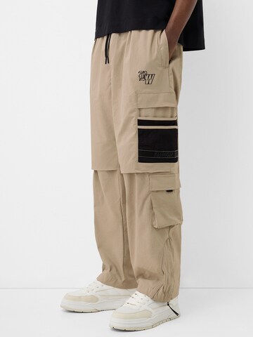 Loosefit Pantalon cargo Bershka en beige : devant