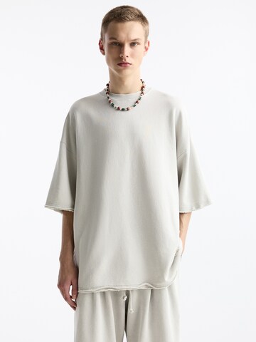 Bluză de molton de la Pull&Bear pe bej: față