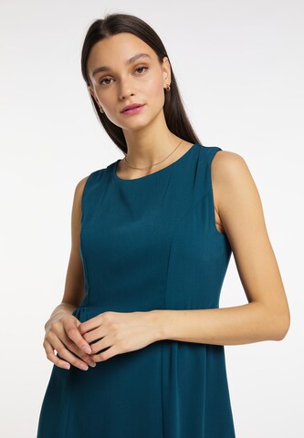 Rochie de cocktail de la Usha pe albastru